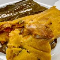 Homemade Gluten-Free Pork Tamale · Homemade steamed cornmeal shell stuffed with our delicious braised pork meat   
Delicious gl...