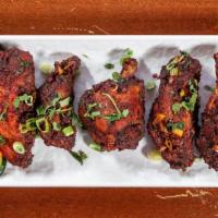 Masala Wings · Traditional chicken wings flavored with indian spices.
