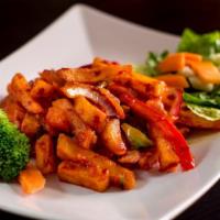 Chilly Chicken · Tender meat cooked with green peppers and red peppers.