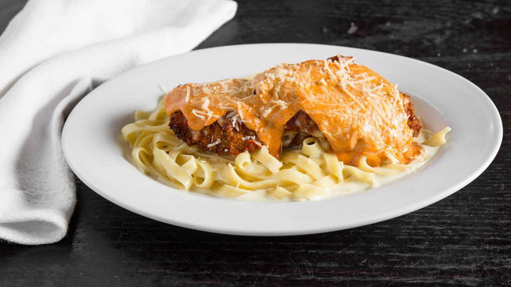 Chicken Parmesan... · breaded chicken breast, mozzarella, light garlic tomato goat cheese sauce, with choice of fettuccine alfredo or spaghetti with red sauce
