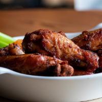 Award Winning Wings (8) · Eight jumbo party wings, dry rubbed, smoked over pecan wood and flash fried. Also available ...