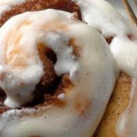 Cinnamon Roll · A fluffy brioche dough, rolled-up with a cinnamon and brown sugar filling, and smothered wit...