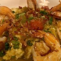 Shrimp & Grits · Cheesy cheddar grits, with six jumbo shrimp, topped with andouille and scallions.