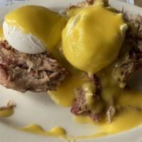 Pulled Pork Benedict · Dry-rubbed pork, smoked low-and-slow for twelve hours, on an English muffin, finished with t...