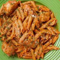Penne Romano Bowl · Chicken, reduced fat vodka sauce and parmesan over whole wheat pasta.