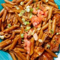 Cajun Penne Pasta Bowl · Cajun chicken, tomatoes, scallions and a red wine sauce over whole wheat pasta.