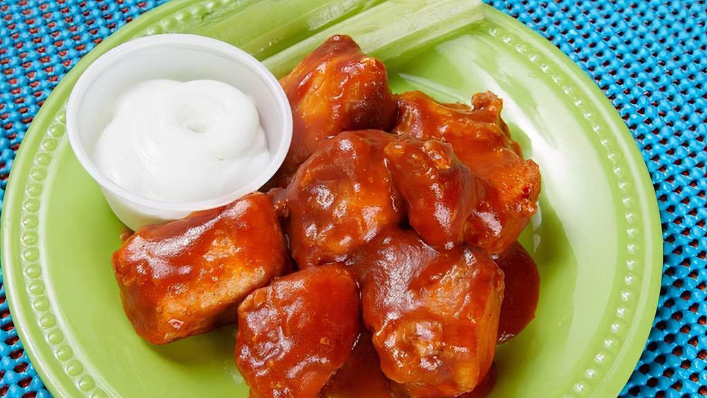 Boneless Bites · Our version on boneless wings - grilled chicken breast or your favorite protein, sautéed to perfection, and tossed in one of our signature sauces. Served with a side of fat-free sour cream.