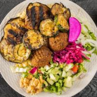 Power Protein Platter · Vegan. Grilled eggplant + grilled zucchini + chickpeas + 2 falafel balls over rice and mixed...