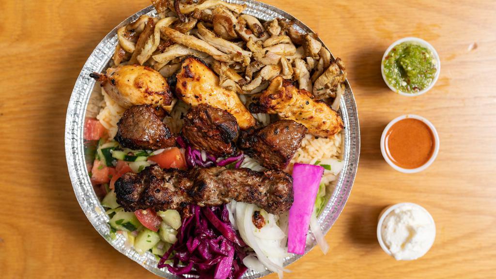 Mix Grill · Chicken kebab+shish kebab+ kofta kebab shawarma over rice and mix green salad.