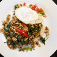 Gapow · Minced meat, basil, bell pepper, garlic soy sauce, rice, and fried egg..