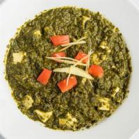 Saag Paneer · Freshly chopped spinach and homemade cottage cheese. Veggie.