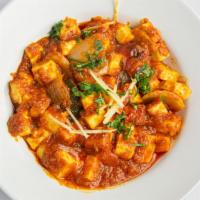 Kadhai Paneer · Paneer (cheese) lightly cooked with fresh ginger, garlic, cilantro and diced tomatoes veggie.