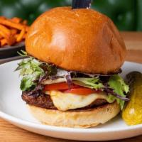 Madison Square Garden · Chargrilled Beyond Burger topped with muenster cheese, garden mix, tomato, and Texas pecan h...
