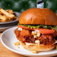 Buffalo Bill · Fried chicken tossed in Buffalo sauce, jalapeño cheese, blue cheese crumbles, lettuce, and t...