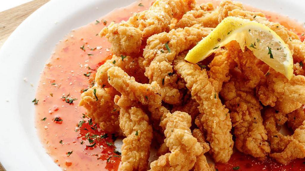 Fried Calamari · Julienned calamari steak fried to perfection and served with sweet Thai pepper sauce.