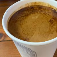 Americano · Coffee under tremendous pressure (espresso) instantly appeased by combining with additional ...