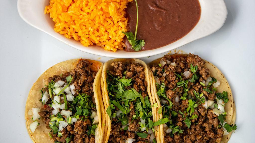 Taco Platter · Three soft corn tortilla tacos, topped with onions, cilantro, Mexican rice and refried beans served on the side with choice of chicken, steak, chorizo, carnitas, chicharrón, vegetarian.