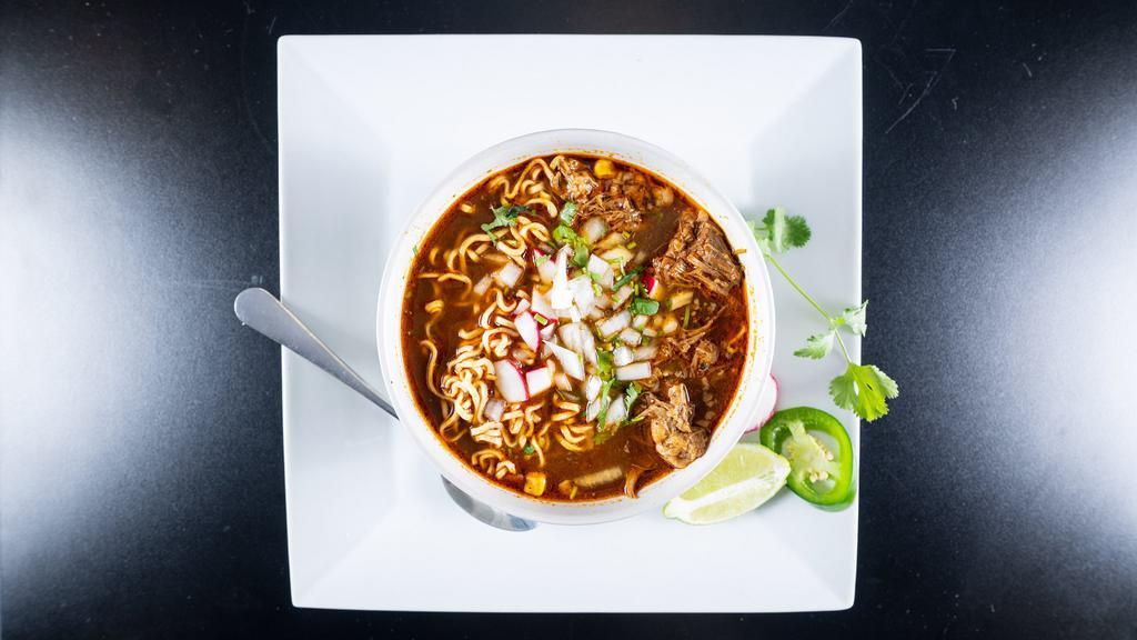 Birria Ramen Soup · Our popular slow cooked birria meat over ramen noodles in perfectly adobo broth.