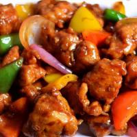 Chili Chicken · Gluten free. Boneless chicken cubes sautéed with chili sauce, bell pepper, and onions.