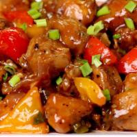 Chicken Manchurian · Gluten free. Boneless chicken cubes, fried and sautéed with onions, bell pepper and manchuri...