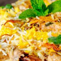 Chicken Biryani · Gluten free. Chicken cooked with basmati rice, yogurt spices, herbs and flavored with saffro...
