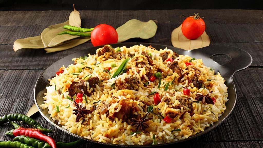 Lamb Biryani · Gluten free. Tender pieces of lamb cooked with basmati rice, yogurt, spices, herbs and flavored with saffron.