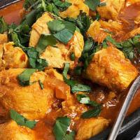 Chicken Vindaloo · Gluten free. Lamb cooked with vinegar, hot pepper, lots of fresh herbs and spice and the che...