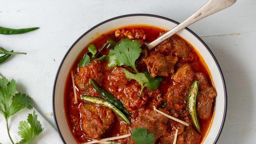 Lamb Chili Masala · Gluten free. Tender pieces of lamb cooked with green pepper, herbs and spices in medium gravy. It is one of the spicier dishes.