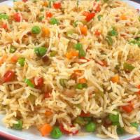 Vegetable Fried Rice · Long grain basmati rice tossed with mixed vegetables, chef's own made soy sauce, salt and pe...