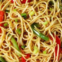 Vegetable Hakka Noodles · Stir fried noodles tossed with mixed vegetables, salt and pepper, and chef's own made soy sa...