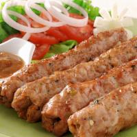 Lamb Shish Kabob · Gluten free. Diced lamb mixed with onion, pepper, fresh herbs and special spices.