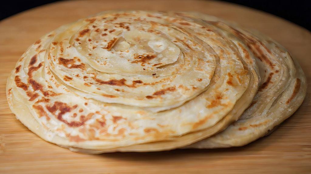 Lacha Paratha · Bread made of natural whole wheat known for their layers and flavorful taste with lots of butter.