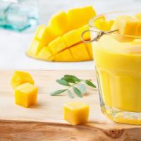 Mango Lassi · Fresh mango pulp mixed with yogurt and sugar. Leaves you with a smooth creamy taste of mango...