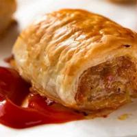 Irish Sausage Rolls · A blend of sausage and herbs baked in a puff pastry served with a pink horseradish sauce.