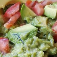 Guacamole & Chips · Fresh Guacamole made in a mortar & pestle, served w/ homemade chips