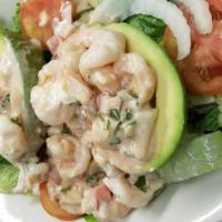 Aguacate Relleno De Camarones · Stuffed Avocado w/ chilled shrimp over a bed of salad