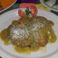Chiles Rellenos De Camarones · Mild green poblano peppers folded egg white filled w/ shrimp in salsa verde, topped w/ melte...
