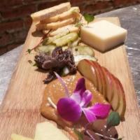 Cheese Board · 3 select local cheeses, Seasonal House Pickles, Seasonal Compote, fruited mustard, crostinis