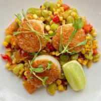 Pan Seared Scallops  · Grilled Corn succotash, cherry tomatoes, jalapeno lime butter. (gluten free)