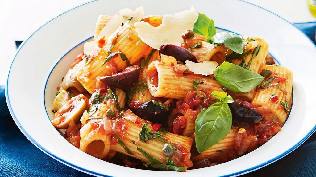 Rigatoni Puttanesca · Green olives, Gaeta olives, capers, paprika, anchovy, garlic with a touch of plum tomato.