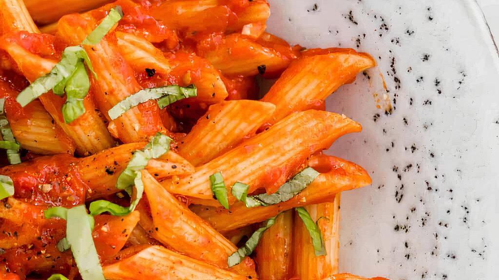 Penne Arrabbiata · Fresh peppers, parsley, extra virgin olive oil, garlic, and a pinch of Parmesan with fresh tomato.