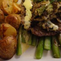 Veal Oscar · Veal dipped in an egg wash, sautéed with shallots, topped with crabmeat and fontina cheese. ...