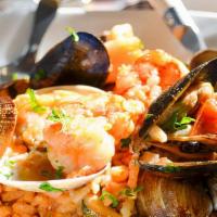 Seafood Panela · Mussels, clams, calamari, shrimp sautéed in your choice of sweet marinara or spicy fra diavo...