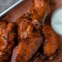 Smoked Chicken Wings - Single · 8 Wings - Smoked, then flash fried. Dry-rubbed or tossed in your choice sauce. Served with R...