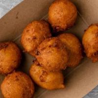 Hush Puppies · A southern specialty! Deep-fried cornbread bites