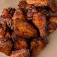 Smoked Chicken Wings - Double · 16 Wings - Smoked, then flash fried. Dry-rubbed or tossed in your sauce. Served with Ranch o...