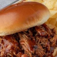 Pulled Chicken Sandwich · Our BBQ Chicken slow-smoked, pulled and tossed in our BBQ Sauce. Served with potato chips