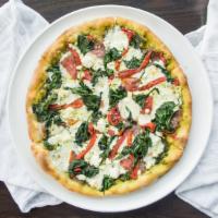 T. · Pesto sauce, fresh mozzarella, local goat cheese, salami, roasted red peppers, spinach.