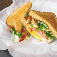 The Narragansett · 2 freshly cooked eggs,toasted wheat, american cheese, bacon, sriracha mayo, topped with lett...