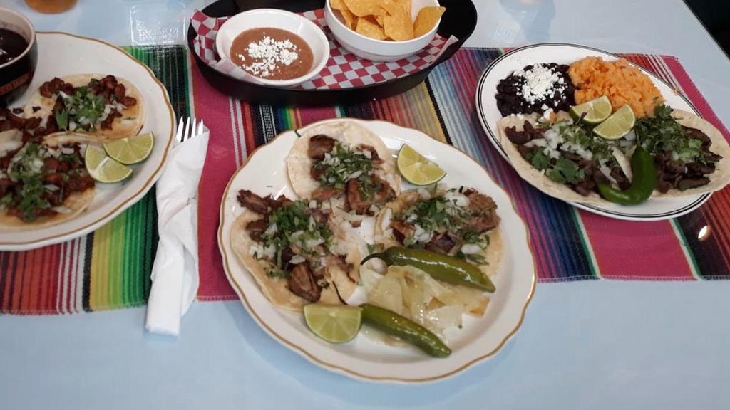 Tacos (1). · Soft corn tortilla filled with your choice of meat (asada, carnitas, chorizo, chicken or pastor). Served with onion, cilantro, and limes.